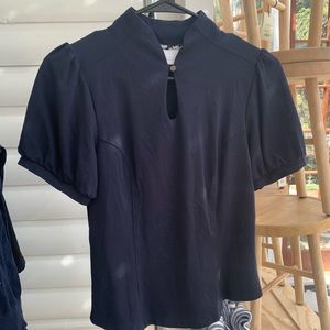 Anthro puff sleeve top